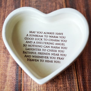 This heart-shaped keepsake box would be a perfect baptism, christening, first communion, or confirmation gift. It's made of earthenware clay, has an Irish blessing and can be personalized.