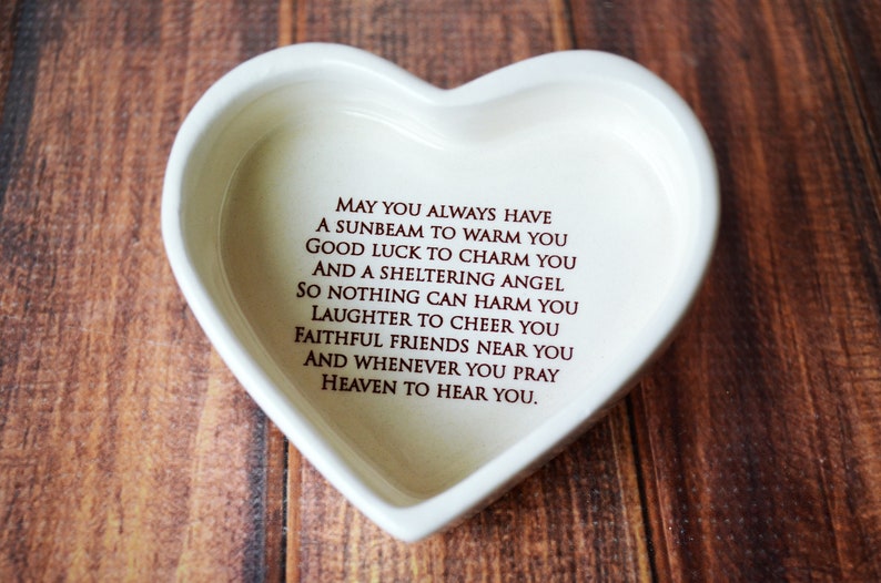 This lovely heart shaped keepsake box would be a perfect Christening, baptism , first communion, or confirmation gift. It is made of earthenware clay, has an Irish blessing prayer inside, and comes with a necklace or bracelet. Can be personalized.