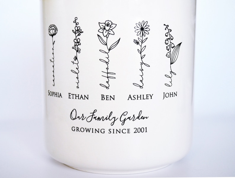 Personalized birth flower flower pot, planter, or vase is the perfect gift for Grandma, Mom, Aunt, or any loved one. The name of the birth flower is written on the stem with the family member's name underneath.