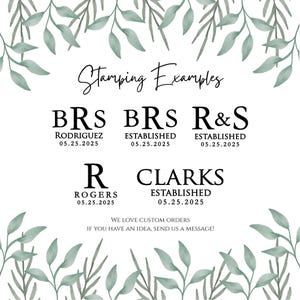 May include: White background with examples of custom stamping. The text "Stamping Examples" is at the top. Below are examples with names, initials, and dates. Green leafy branches frame the top and bottom. The text "We love custom orders" is at the bottom.