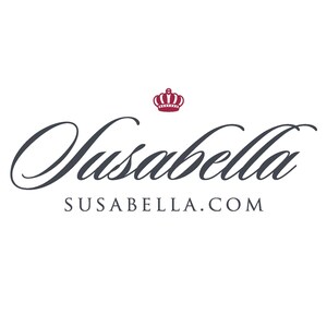 May include: A logo for a company called Susabella. The logo features a stylized cursive font with the company name "Susabella" in dark gray. The name is centered above the company website address "susabella.com" in a smaller font. A small red crown is positioned above the company name.