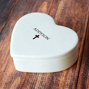 This heart-shaped keepsake box would be a perfect baptism, christening, first communion, or confirmation gift. It's made of earthenware clay, has an Irish blessing and can be personalized.