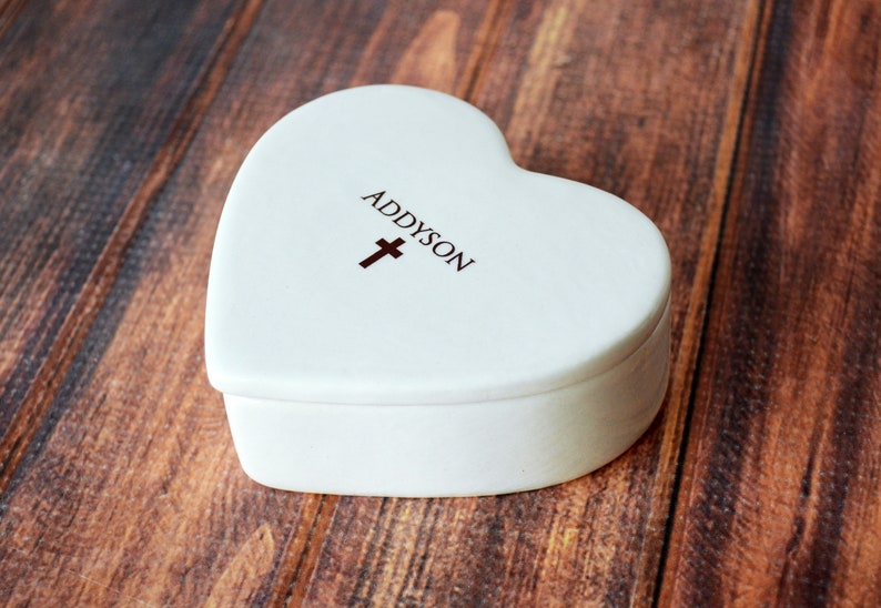 This lovely heart shaped keepsake box would be a perfect Christening, baptism , first communion, or confirmation gift. It is made of earthenware clay, has an Irish blessing prayer inside, and comes with a necklace or bracelet. Can be personalized.