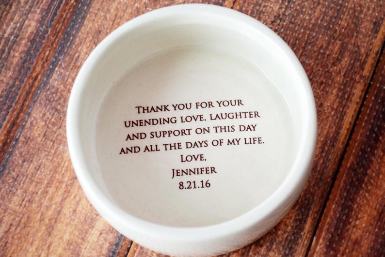May include: White ceramic bowl with a brown inscription that reads "Thank you for your unending love, laughter and support on this day and all the days of my life. Love, Jennifer 8.21.16"