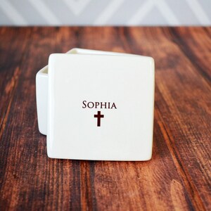 This lovely square keepsake box would be a perfect gift for your godchild and is one that can be enjoyed all year round. This would be a great baptism, christening, confirmation or first communion gift. Can be personalized.