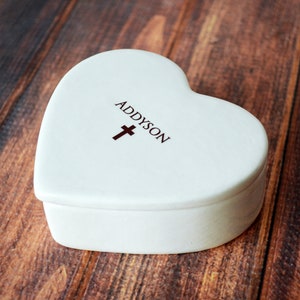 This heart-shaped keepsake box would be a perfect baptism, christening, first communion, or confirmation gift. It's made of earthenware clay, has an Irish blessing and can be personalized.