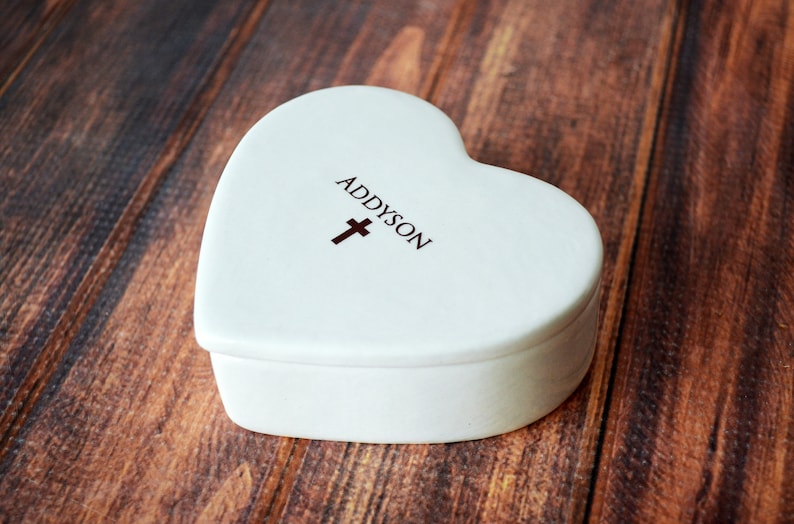 This heart-shaped keepsake box would be a perfect baptism, christening, first communion, or confirmation gift. It's made of earthenware clay, has an Irish blessing and can be personalized.