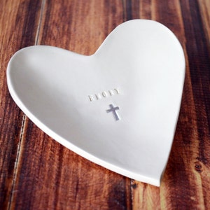 This heart bowl is a perfect baptism, christening, communion or confirmation gift! Made of ceramic and can be personalized with a name.