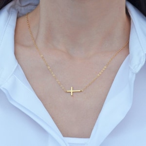 This cross necklace comes with a heart-shaped keepsake box would be a perfect baptism, christening, first communion, or confirmation gift. It has an Irish blessing inside.