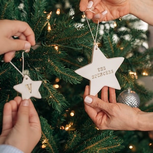 Family ornament set personalized ornaments with name and initials. Add new stars as family members are added