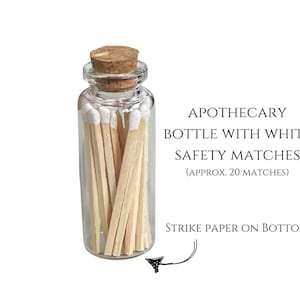 Apothecary bottle with cork stopper contains approx. 20 white tipped matches