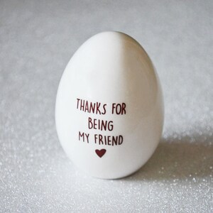 This Easter egg would be a unique Easter gift for any friend, family, co-worker or loved one. Can be used as an adorable easter basket stuffer. The front says 'You're a Good Egg' and the back says 'Thanks for being my friend'