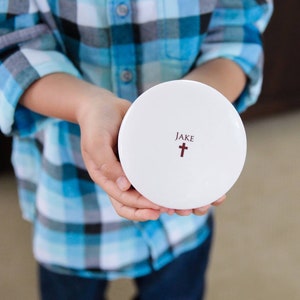 This lovely round keepsake box would be a perfect baptism, christening, first communion, or confirmation gift. It can be personalized with a name and custom message.