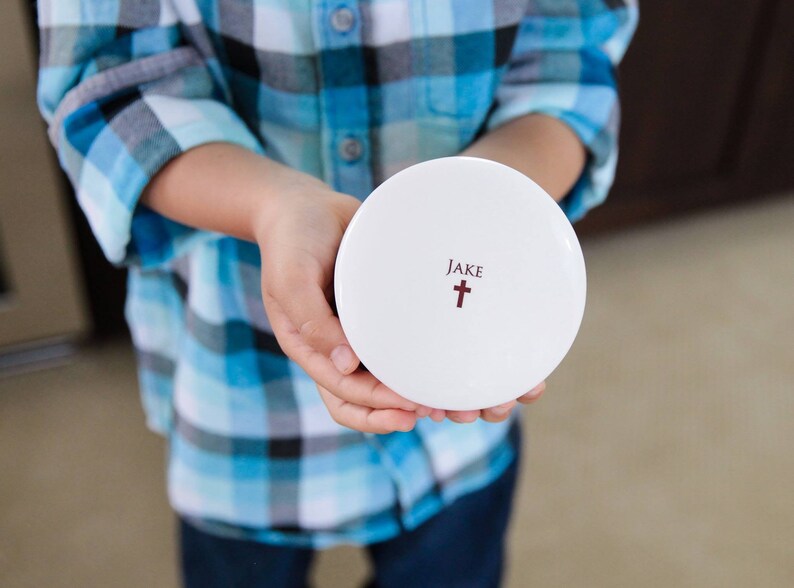 This lovely round keepsake box would be a perfect baptism, christening, first communion, or confirmation gift. It can be personalized with a name and custom message.