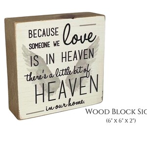 Wood block reads: Because someone we love is in heaven there's a little big of heaven in our home.