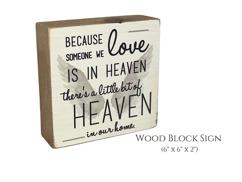 Wood block reads: Because someone we love is in heaven there's a little big of heaven in our home.