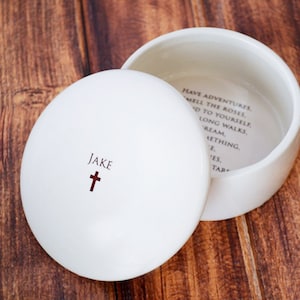 This lovely round keepsake box would be a perfect baptism, christening, first communion, or confirmation gift. It can be personalized with a name and custom message.