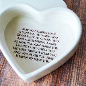 This heart-shaped keepsake box would be a perfect baptism, christening, first communion, or confirmation gift. It's made of earthenware clay, has an Irish blessing and can be personalized.