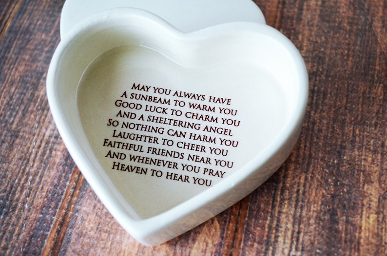 This heart-shaped keepsake box would be a perfect baptism, christening, first communion, or confirmation gift. It's made of earthenware clay, has an Irish blessing and can be personalized.