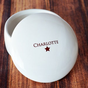 This lovely round jewelry box or keepsake box would be a perfect graduation gift for a high school or college graduate.