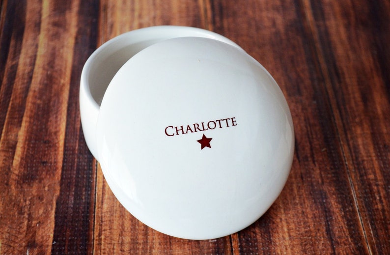 This lovely round jewelry box or keepsake box would be a perfect graduation gift for a high school or college graduate.