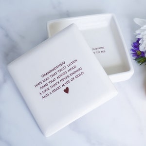 White ceramic box with a lid. The box has a quote about grandmothers on the lid and personalized text on the inside.