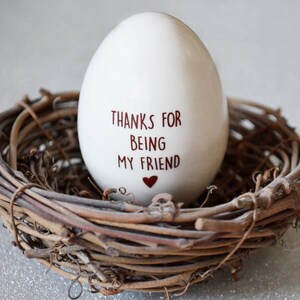 This Easter egg would be a unique Easter gift for any friend, family, co-worker or loved one. Can be used as an adorable easter basket stuffer. The front says 'You're a Good Egg' and the back says 'Thanks for being my friend'