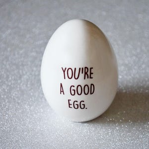 This Easter egg would be a unique Easter gift for any friend, family, co-worker or loved one. Can be used as an adorable easter basket stuffer. The front says 'You're a Good Egg' and the back says 'Thanks for being my friend'