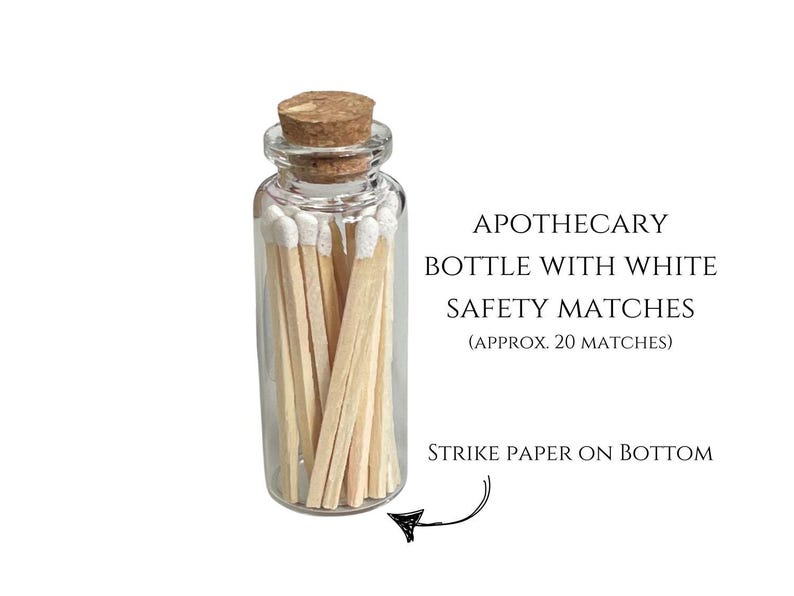 Gift box includes a bottle with white tipped matches