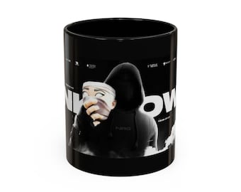 Masked Figure Holding Cup coffee mug | black accent ceramic mug