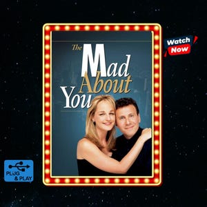 May include: A rectangular digital display featuring the title The Mad About You in white and gold text. A blonde person and a dark-haired person are shown from the chest up. The frame is lined with yellow light bulbs. A Watch Now icon and a Plug & Play icon are visible.