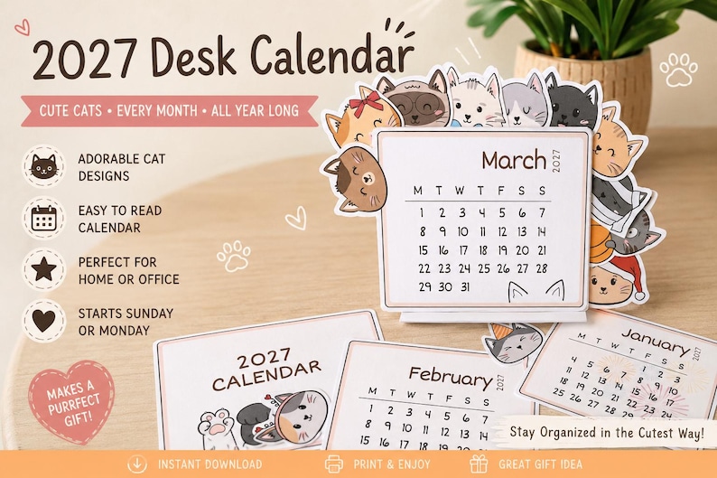 May include: A 2027 desk calendar featuring illustrated cat designs. The calendar displays the month of March with a grid of dates, surrounded by various cartoon cat faces. Additional calendar pages for January and February are visible below.