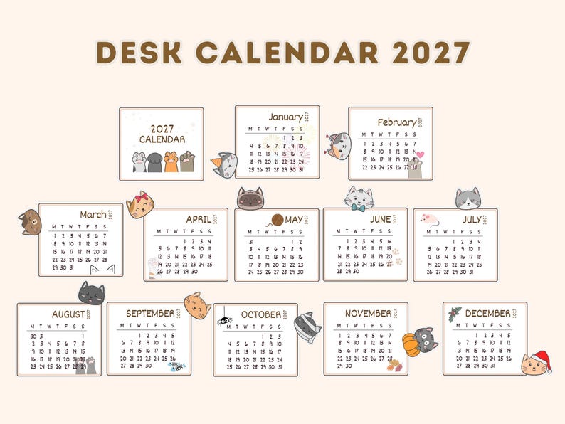 May include: A 2027 desk calendar featuring twelve monthly pages with black text and numbers. Each month displays a unique cartoon cat illustration, including cats with hats, yarn, pumpkins, and holiday accessories, set against a light cream background.
