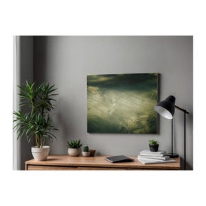 May include: A rectangular wall art piece featuring an abstract landscape in shades of dark green, olive, and muted gold. The artwork displays textured, layered brushstrokes that create a sense of depth and movement across the canvas surface.