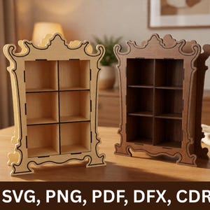May include: Two wooden display shelves with six square compartments each, featuring ornate, laser-cut edges. One shelf is light-colored wood, and the other is dark-stained wood. The text SVG, PNG, PDF, DFX, CDR is displayed at the bottom.