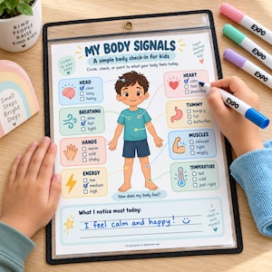 May include: A My Body Signals dry-erase chart in a black frame featuring a cartoon child and check-boxes for physical sensations. The chart includes text like Head, Breathing, Hands, Energy, Heart, Tummy, Muscles, and Temperature. A blue marker is used to check boxes.