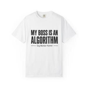 May include: A white short-sleeved t-shirt featuring the black text MY BOSS IS AN ALGORITHM centered on the chest. Below the main text, the words Gig Worker Humor are printed in a smaller font, flanked by two horizontal lines on each side.