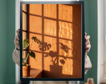 Sunlight Shadow Plant Wall Art | Monstera Shadow Poster | Warm Orange Aesthetic Print | Minimalist Botanical Shadow Photography