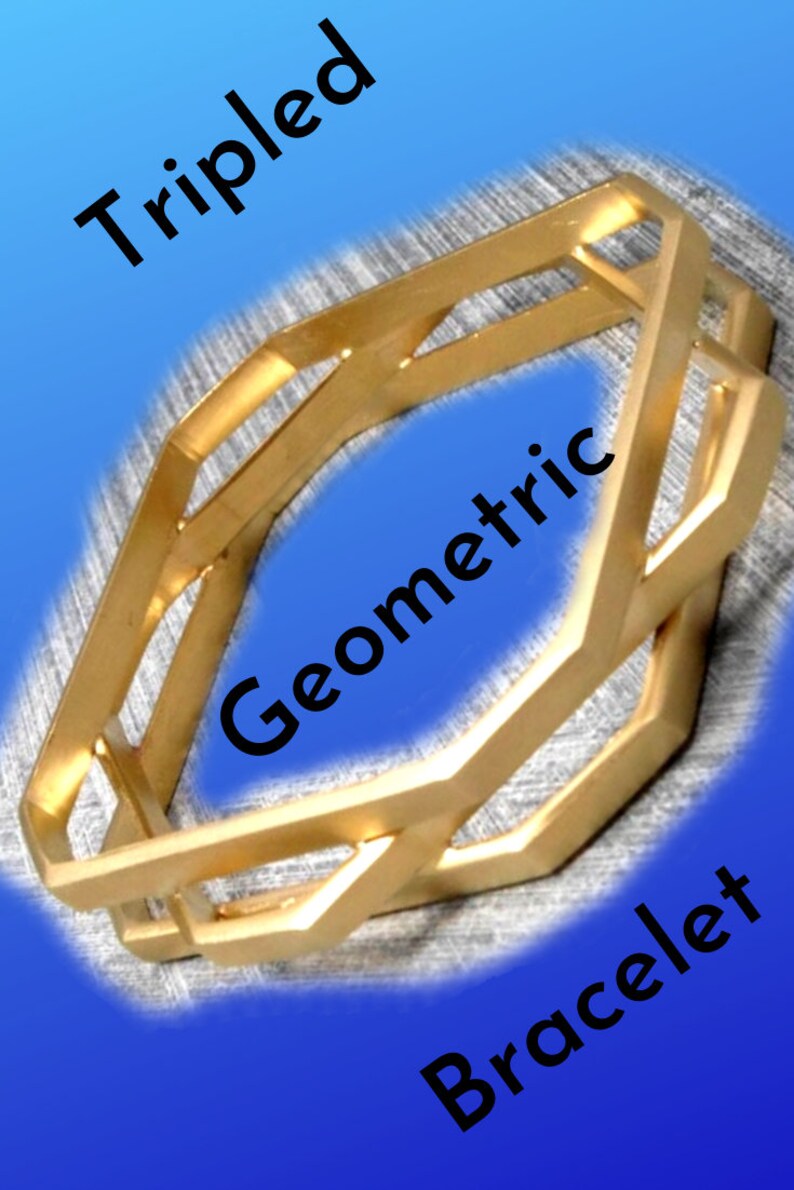 May include: Gold-colored geometric bracelet with a triple design. The bracelet features an open, angular design with the word "Tripled" at the top, "Geometric" in the middle, and "Bracelet" at the bottom.