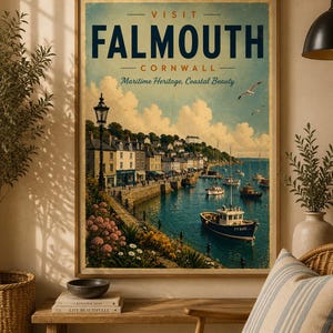 May include: A vintage-style travel poster featuring the text VISIT FALMOUTH CORNWALL Maritime Heritage, Coastal Beauty. The illustration depicts a harbor with boats, a stone quay, a street lamp, and colorful flowers under a cloudy blue sky.