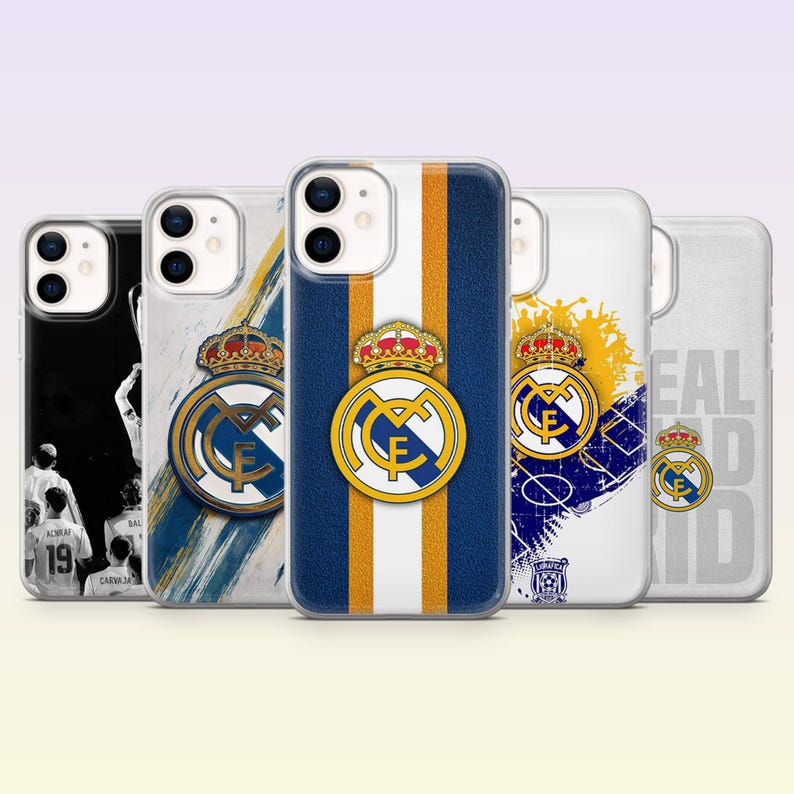 May include: Five smartphone cases featuring Real Madrid branding. Designs include a black and white player photo, a blue and gold striped pattern, a yellow and blue graphic, and a white case with the text REAL MADRID, all displaying the club crest.