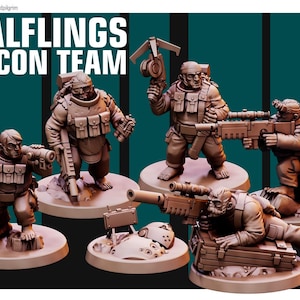 May include: A set of five miniature figures titled HALFLINGS RECON TEAM. The figures are brown, sculpted in tactical gear with rifles, a crossbow, and goggles. One figure is prone on a crate, while others stand on circular bases.