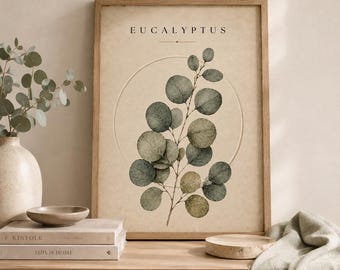 May include: A framed wall art print featuring a botanical illustration of a eucalyptus branch with round green leaves centred within a thin circular line. The background is a textured beige paper with the word EUCALYPTUS printed in black.