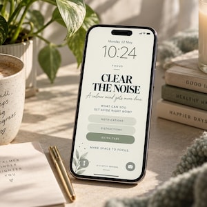 May include: A smartphone displaying a digital interface with the text CLEAR THE NOISE, A calmer mind gets more done, and WHAT CAN YOU SET ASIDE RIGHT NOW? The screen features buttons for NOTIFICATIONS, DISTRACTIONS, and EXTRA TABS in a soft palette.