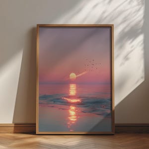 Peut inclure: Une impression d'art mural encadrée représentant un coucher de soleil surréaliste sur un océan calme. La scène montre une planète à anneaux brillante au-dessus de l'horizon, projetant un reflet doré sur l'eau, avec des oiseaux en vol.