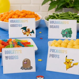 May include: Four white rectangular food labels with Pokémon characters and text: Charizard's Cheetos, Bulbasaur's Beans, Diglett's Worms, and Pikachu's Puffs. Each card features a colorful gradient font and a specific character illustration.
