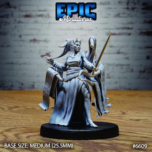May include: A light gray resin miniature figure of a horned humanoid character wearing a long flowing robe. The figure holds a thin sword in one hand and is surrounded by floating scrolls with etched symbols, standing on a 25.5mm round base.