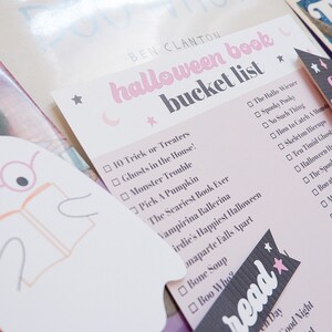 May include: A pink and white printable Halloween bucket list with a checklist of spooky activities and books to read. The list includes titles like "The Scariest Book Ever" and "Boo Who?"  The list is decorated with stars and a crescent moon.