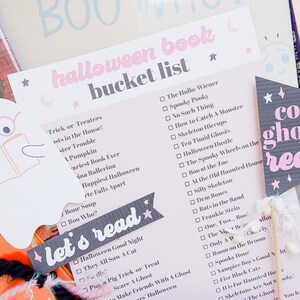 May include: A pink and gray printable Halloween book bucket list with a checklist of spooky books to read. The list includes titles like "The Hallo Wiener", "Spooky Pooky", "No Such Thing", and "How to Catch a Monster".
