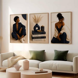 May include: A set of three framed wall art prints. The left print shows a person in a dark blue suit. The center print features a dark vase with dried grass atop a stack of books. The right print depicts a person in a dark blue dress.